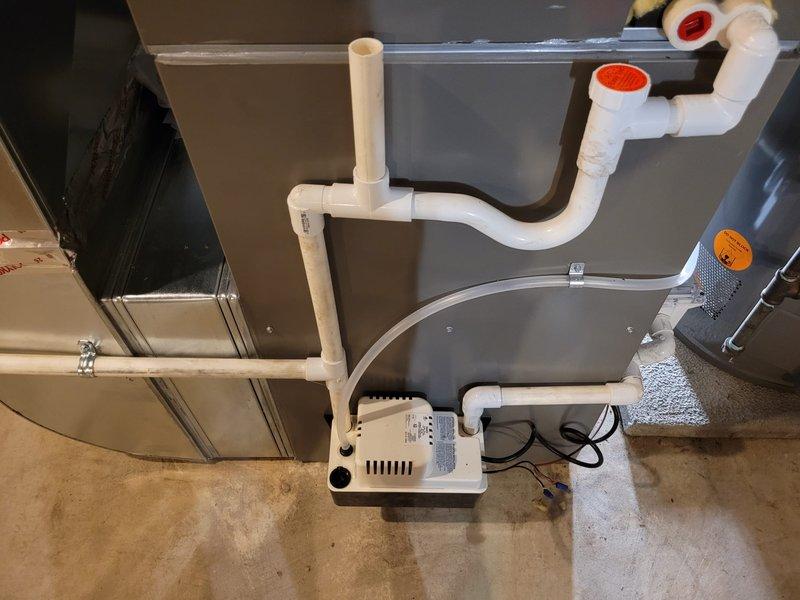 Completed full HVAC system installation including Lennox furnace with new chimney liner, air conditioning unit, whole-home humidifier, and condensate pump with proper PVC drainage routing. All equipment installed to manufacturer specifications, tested for proper operation, and system commissioned successfully.