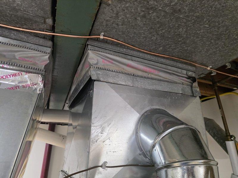 Responded to warranty call for failed electrical and mechanical inspections on recent furnace installation. Addressed electrical code violation by installing GFCI protection on furnace receptacle as required by inspector. Corrected mechanical code deficiency by installing proper hangers on horizontal PVC condensate drain line at required 4-foot intervals per code specifications. Documented all corrections with photographs for inspection records and completed required follow-up documentation.