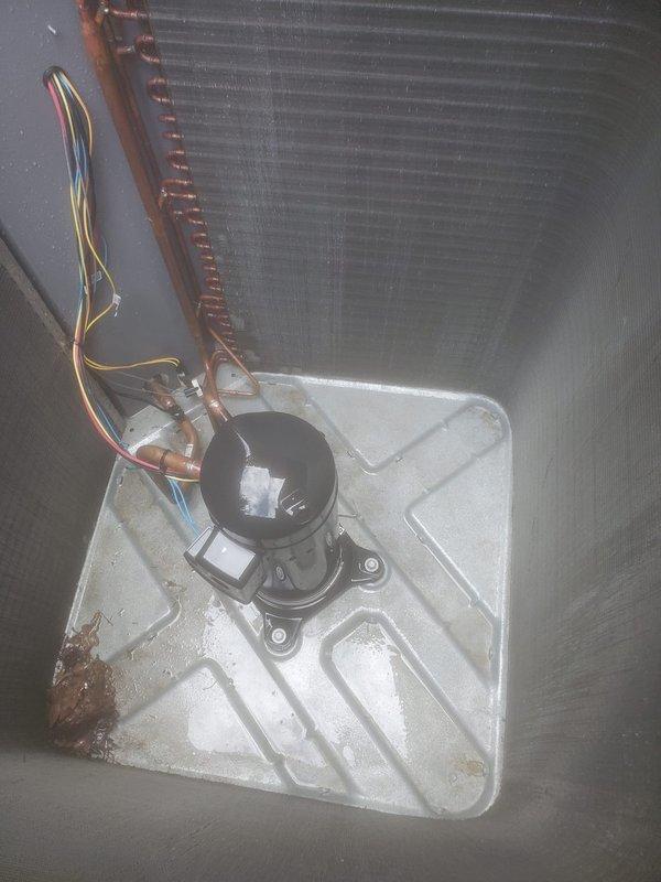 Completed scheduled cooling maintenance on residential air conditioning system. Performed comprehensive inspection of outdoor condenser unit and indoor evaporator components, documenting system condition through photographic records. Verified proper operation of compressor, condenser coils, and drainage system, with unit showing normal operational wear and minor debris accumulation on exterior fins requiring routine attention during maintenance visit.
