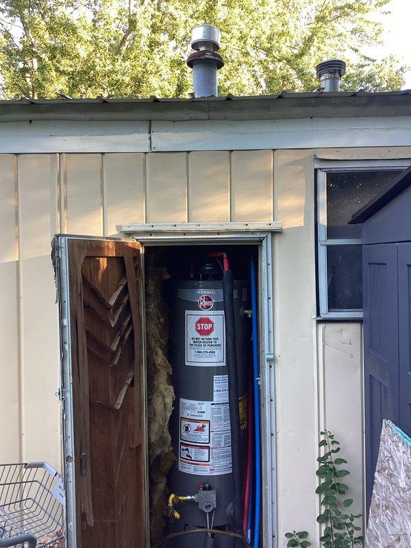 Completed on-site plumbing estimate for water heater replacement. Assessed existing Rheem Performance water heater installed in exterior utility closet, documented current installation including hot and cold water supply lines, pressure relief valve configuration, and venting system with dual exhaust pipes through roof. Photographed unit specifications, existing piping connections, compartment dimensions, and insulation conditions to provide accurate replacement proposal.