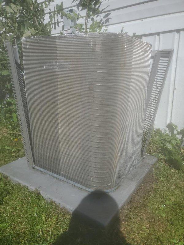 Completed scheduled cooling season maintenance inspection on outdoor air conditioning condenser unit. Performed comprehensive system evaluation including inspection of condenser coil fins, compressor operation, refrigerant line connections, and drainage system functionality. Unit found in good operational condition with all components functioning within normal parameters.