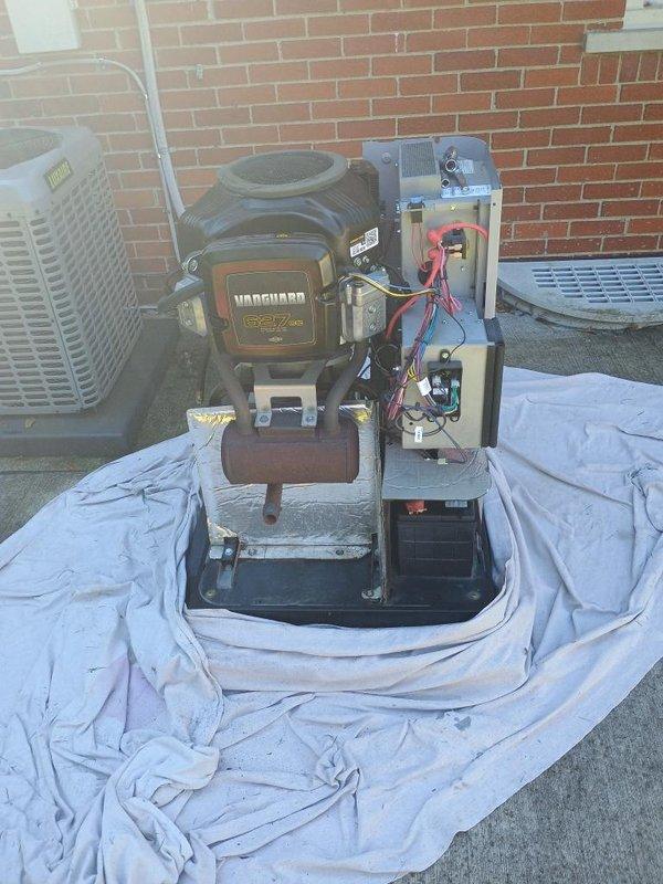 Performed scheduled maintenance on standby generator system. Disassembled and inspected blower motor assembly, control section, and Vanguard 557 engine components. Removed and replaced worn bearings from motor assembly. Cleaned all components, verified wiring connections on control board, and reassembled unit. Conducted operational test to confirm proper function of all systems.