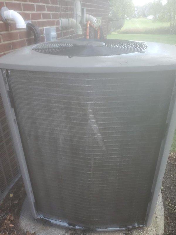 Completed routine AC maintenance service 1-3 on residential outdoor condenser unit. Performed standard preventive maintenance procedures including inspection of cabinet exterior, protective grilles, and fan assembly. Unit found in functional condition with normal weathering present on exterior surfaces.
