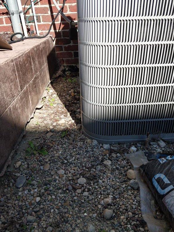 Completed scheduled air conditioning maintenance on residential cooling system. Performed comprehensive inspection of outdoor condenser unit, verified proper operation of all components, and documented equipment condition with photographic records. Unit found in satisfactory working condition with minimal debris accumulation around exterior fins and gravel pad area.