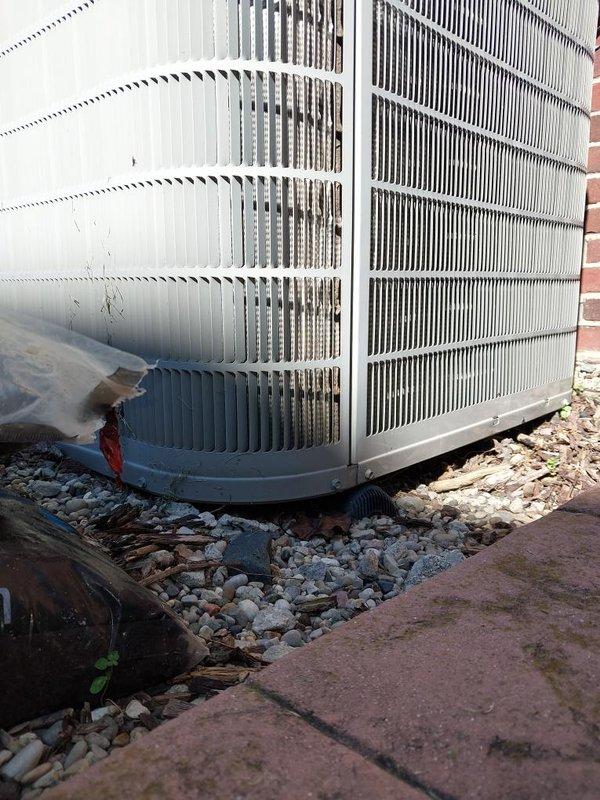 Completed scheduled air conditioning maintenance on residential cooling system. Performed comprehensive inspection of outdoor condenser unit, verified proper operation of all components, and documented equipment condition with photographic records. Unit found in satisfactory working condition with minimal debris accumulation around exterior fins and gravel pad area.