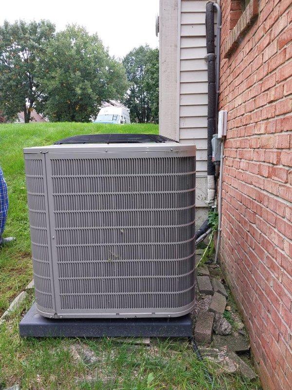 Responded to service call for A/C unit that was struck by lawnmower and knocked loose from mounting position. Repositioned condenser unit on pad, secured all mounting hardware, and verified proper levelness and stability. Inspected unit for any damage to coils, fan assembly, and cabinet; confirmed all components remained intact and operational with no refrigerant leaks detected.