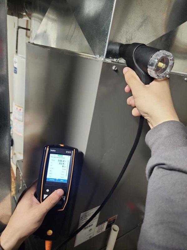 Completed scheduled heating system maintenance and tune-up on residential furnace unit. Performed comprehensive system diagnostics using digital measuring instruments to verify proper operation and temperature readings. System confirmed to be functioning properly with all parameters within normal operating specifications.