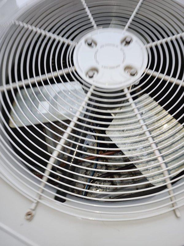Completed routine cooling season maintenance on outdoor AC condensing unit. Performed comprehensive inspection of electrical components including capacitor, contactor, and wiring connections; all components found operating within normal parameters. Cleaned condenser coil fins and fan assembly, removing accumulated debris and surface contamination from outdoor exposure.