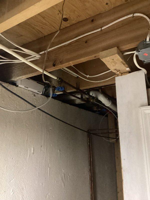 Conducted comprehensive assessment of existing heating system in 3200 square foot residential property to provide furnace replacement estimate. Inspected current furnace unit including control panel, electrical components, ductwork connections, and condensate drainage system. Evaluated basement installation configuration, existing duct routing through ceiling joists, and current HVAC infrastructure to determine appropriate replacement specifications and installation requirements for new furnace system.