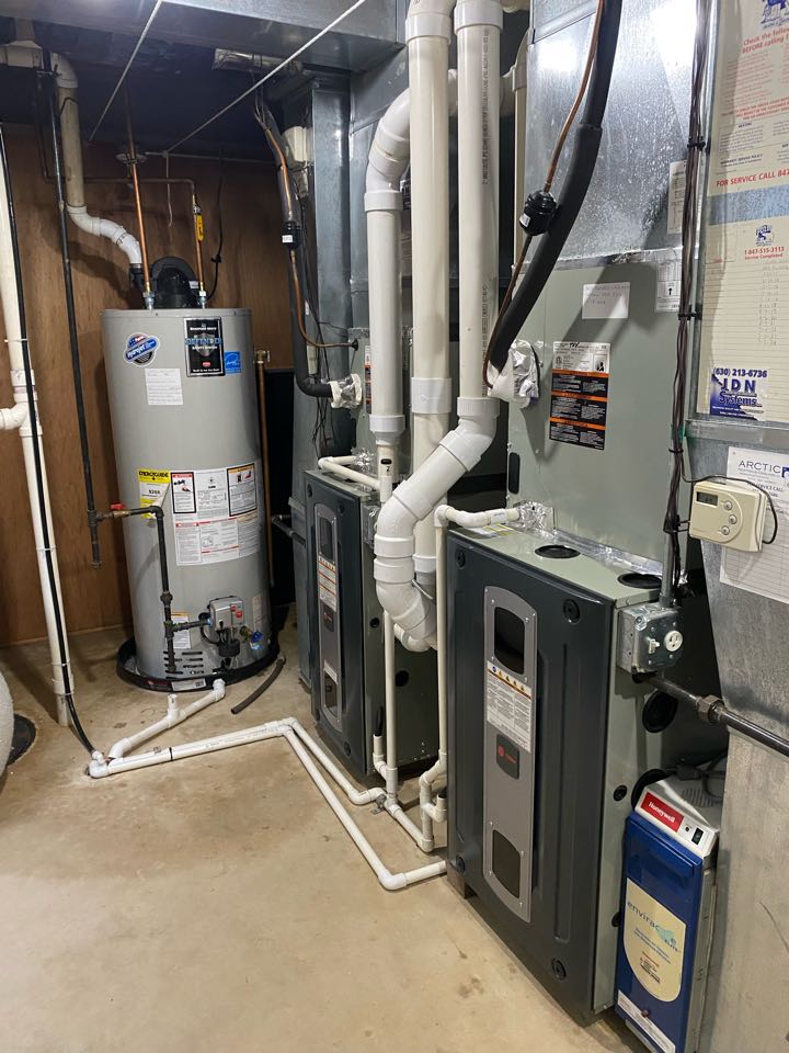 Heating call performed tune up on Trane system,Honeywell humidifier tune up .installed new humidifier pvc drain pipe 