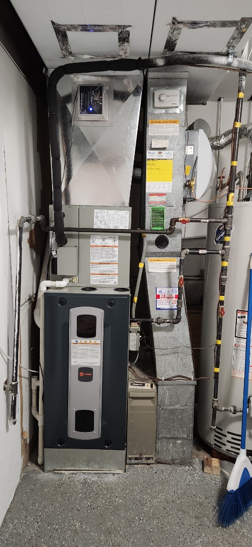 heating service installed new Trane S9V2 variable spe3d 97% efficient two furnace as well and a. ew ac