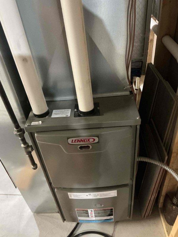 Performed routine maintenance on Lennox furnace. System operating at proper temperature (96.9°F). No issues identified during the tune-up service.
