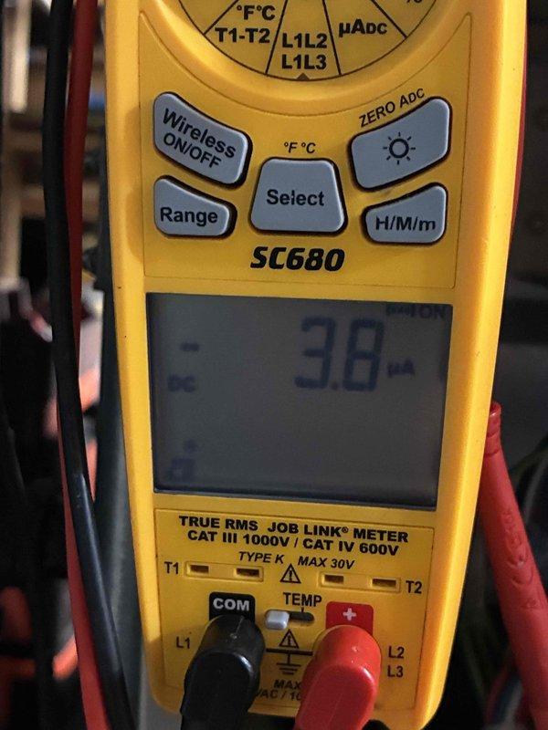 Performed semi-annual gas furnace tune-up service. Conducted electrical testing with multimeter (SC680) checking microamp readings (3.8 μA) indicating proper flame sensing operation. Inspected Carrier furnace system including venting, PVC exhaust/intake pipes, and condensate drainage. All components functioning properly with no issues identified.