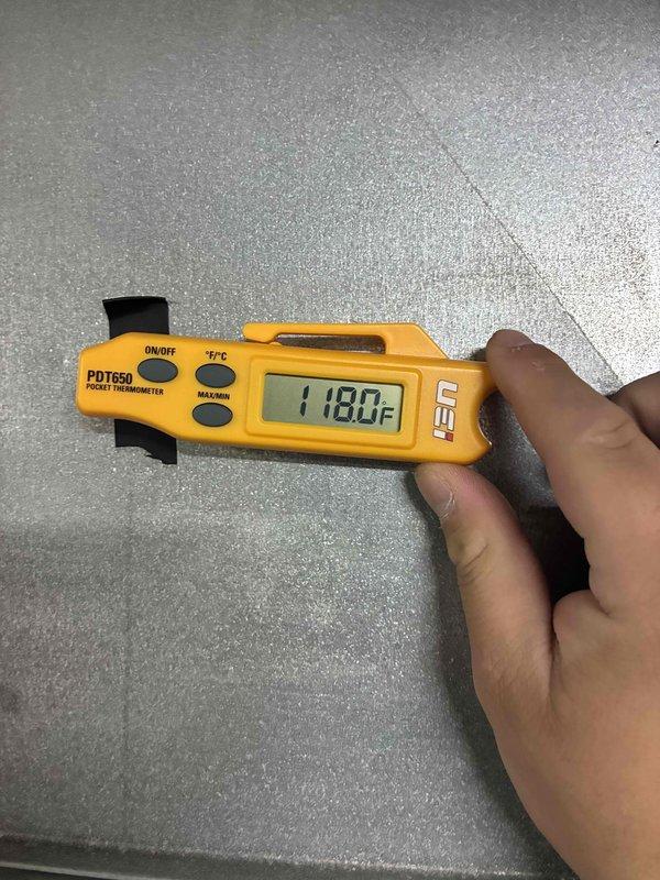 Performed semi-annual maintenance on Carrier gas furnace. Conducted temperature measurements with digital thermometer showing 118.0°F at supply vent. Inspected ventilation system including PVC exhaust pipes and connections. All components operating within normal parameters.