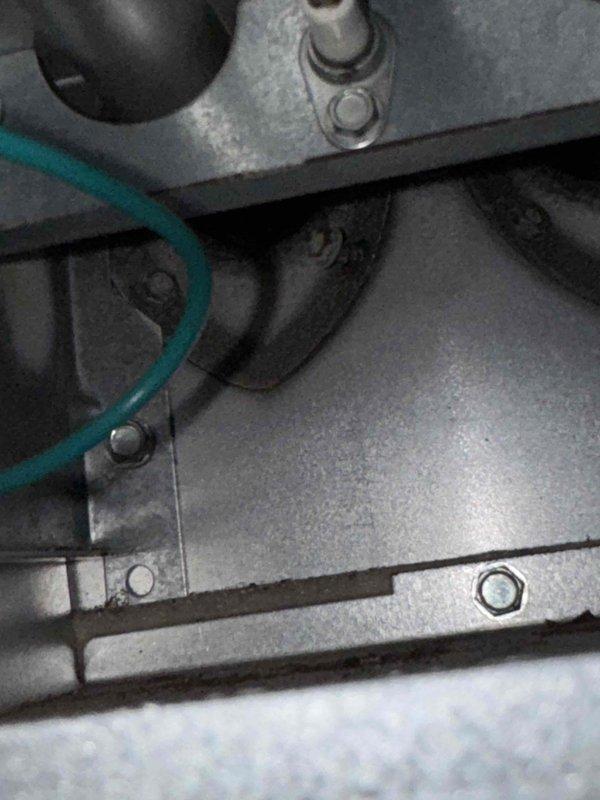 Performed furnace tune-up service and identified multiple critical issues: failing ignitor causing extremely hard ignition, loose screw in heat exchanger, and inducer motor leaking condensation. Documented problems with inspection photos of the furnace components and provided customer with replacement estimate.