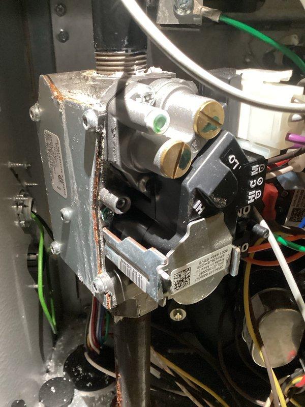 Responded to no heat complaint on 12-year-old HVAC system with warranty coverage. Diagnostic testing revealed gas valve failure preventing proper ignition. Successfully replaced defective gas valve, restoring normal heating function. System now operating correctly with proper gas flow.
