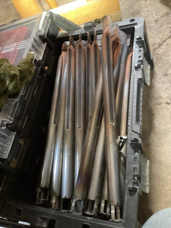 Performed comprehensive tune-up on heating system, finding significant dirt accumulation affecting efficiency. Cleaned heat exchanger components, removing built-up debris from fins and radiator elements. Inspected plumbing connections and control valves in utility area, noting some minor corrosion at connection points requiring monitoring.