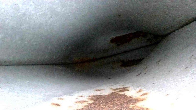 Performed scheduled winter maintenance tune-up on a Lennox Elite Series furnace with attached Aprilaire humidifier. Unit was functioning normally with no operational issues identified. Documented water damage on ceiling surface with visible discoloration and potential mold growth that requires attention.