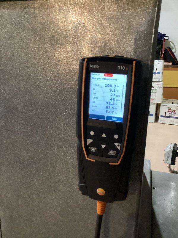 Performed furnace tune-up with thorough cleaning of interior components due to accumulated dirt. Inspected electrical connections and control systems. Combustion analysis completed using Testo 310 analyzer, which confirmed proper operation with 93.3% efficiency, 9.1% O2, and CO levels at 27 ppm, all within acceptable parameters.