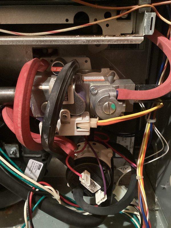 Conducted comprehensive furnace tune-up with safety inspection. Verified gas valve assembly functionality and proper electrical connections. Confirmed system level and alignment during inspection. System operating normally; humidifier functioning correctly to address customer's winter humidity concerns.