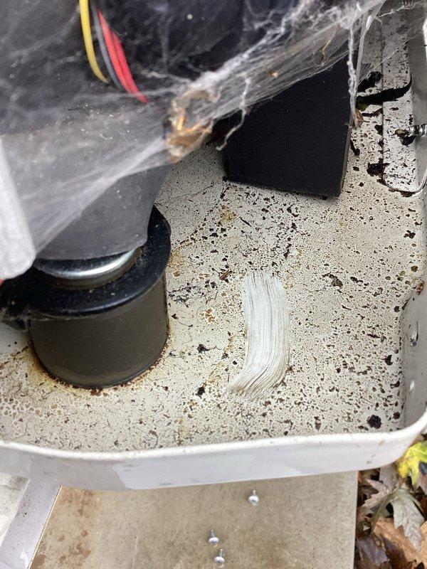 Responded to no heat/cooling complaint with refrigerant leak code PC03. Inspection revealed oil residue on bottom of unit, confirming active refrigerant leak. Visual inspection showed evidence of refrigerant loss, with cobwebs and dust accumulation in component housing area. Customer was notified of findings as requested.