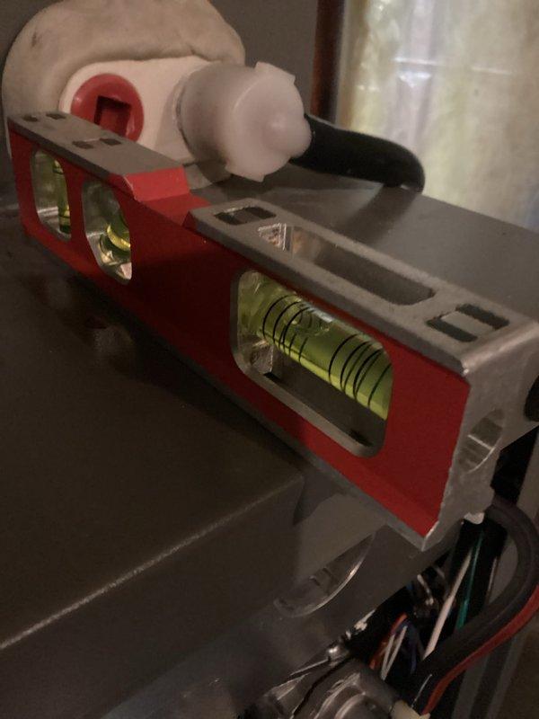 Performed scheduled bi-annual maintenance tune-up on heating system. Checked equipment levelness with bubble level and conducted pressure testing with diagnostic gauge, which showed 17.1 PSI. Customer was not present during service. All preventative maintenance completed per membership agreement specifications.