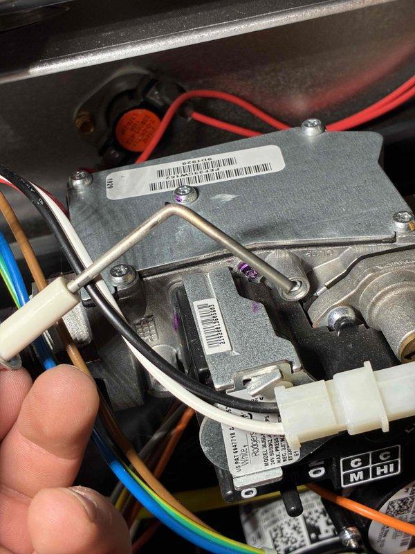 Performed scheduled maintenance service on HVAC system. Inspected and tested control board components, checking terminal connections and wire integrity. Verified proper operation of control interface and electronic assembly with particular attention to the labeled components and connection points.