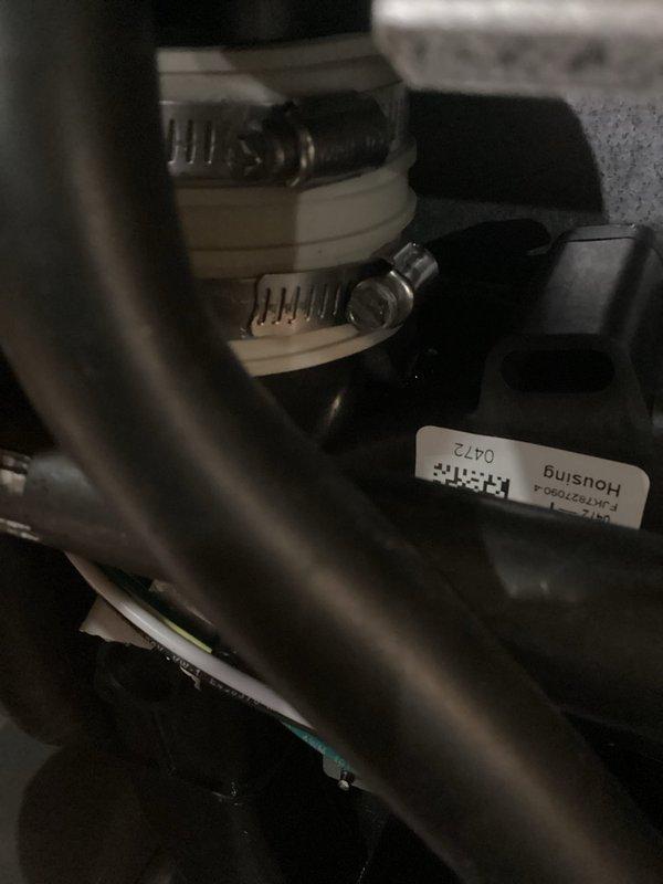 Performed comprehensive tune-up on furnace system with humidifier. Inspected internal components and electrical connections after removing access panel. Verified secure installation of drainage pipes and checked mechanical connections including hose clamps on condensate line. All components functioning properly with no issues detected.