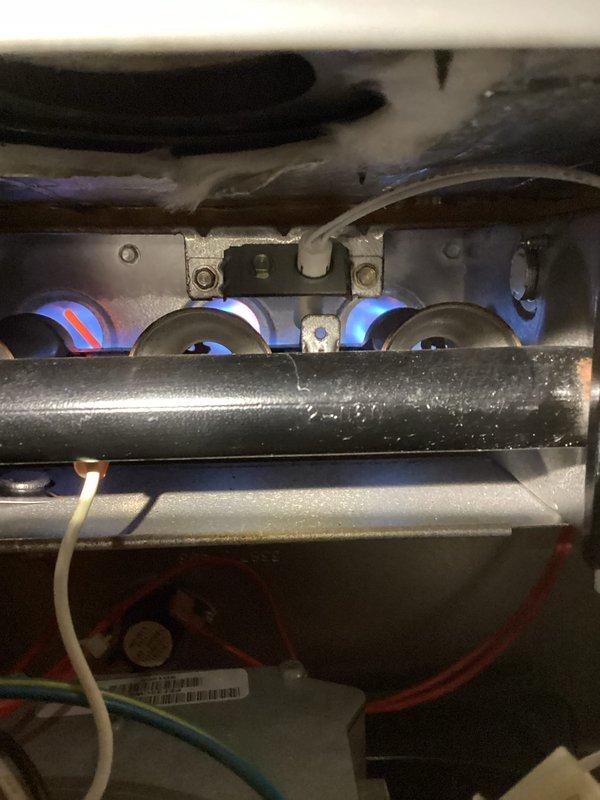 Performed scheduled maintenance tune-up on the heating system, inspecting the burner assembly and verifying proper flame pattern. Examined the condensate drain system for proper installation and function. All components are operating within normal parameters with good combustion and adequate drainage.