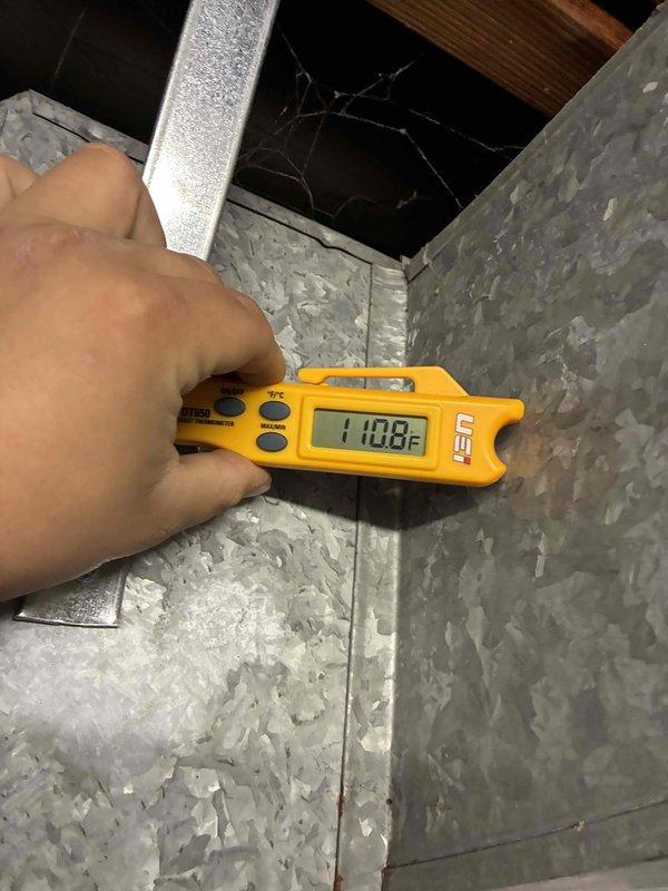 Performed standard maintenance tune-up on HVAC system. Measured supply air temperature at 110.8°F and verified electrical parameters with SC680 multimeter, confirming 51.68 μF capacitor reading. System functioning within normal parameters after service.