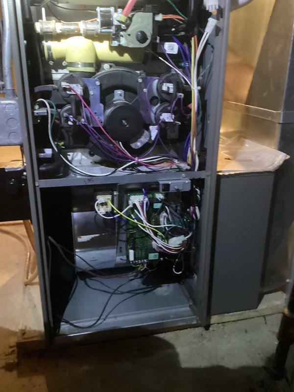 Performed comprehensive tune-up on furnace system, including internal component inspection and combustion analysis. Verified proper wiring connections throughout the unit. Conducted flue gas testing with Testo analyzer, confirming efficient operation with excellent combustion readings (87.2% efficiency, CO at safe levels of 3 ppm, and proper air/fuel mixture with 3.97% CO₂).
