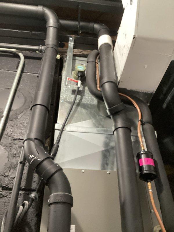 Performed routine preventative maintenance on HVAC system. Inspected mechanical room equipment including copper supply/return lines, expansion tank, and associated valving. Examined insulated distribution piping and control mechanisms, noting proper installation and function. All components operating within normal parameters.