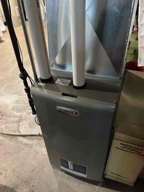 Performed routine tune-up maintenance on Lennox furnace system. Inspected unit for proper operation and identified signs of corrosion at connection points. Cleaned and serviced system components including the Spaceguard Air Cleaner. Verified integrity of PVC venting system and electrical connections to ensure safe, efficient operation for the heating season.
