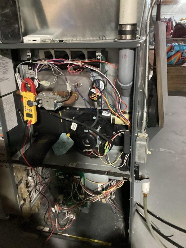 Performed comprehensive furnace tune-up with full system inspection. Conducted combustion analysis with Testo 310 analyzer showing 97.2% efficiency and CO2 at 7.1%. Verified electrical components with amp draw readings and inspected blower assembly, control board, and gas valve for proper operation.