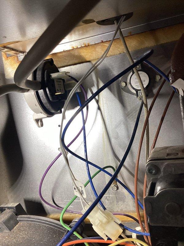 Responded to no-heat call for Lennox model G26Q4/5-75-5 (SN: 5800C 15112), approximately 10+ years old. Inspection revealed faulty flame sensor and damaged ignition control module with visible wire degradation. Replaced both components, cleaned burner assembly, and verified proper system operation with successful ignition and flame maintenance. System now functioning within manufacturer specifications.