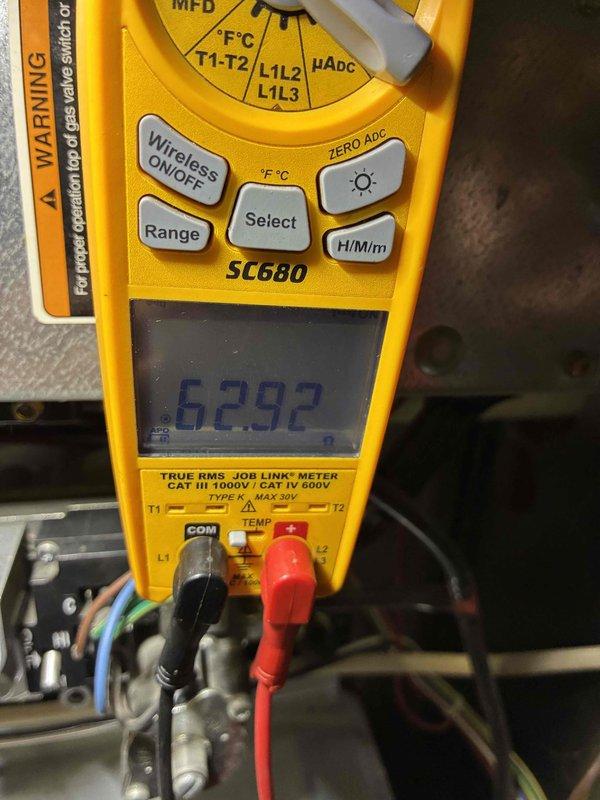 Performed routine HVAC maintenance service. Conducted electrical system diagnostics using Fieldpiece SC680 multimeter, confirming proper voltage readings at 62.92V. Inspected and verified air filter was clean and properly installed, with no visible dust accumulation or damage to filtration media.