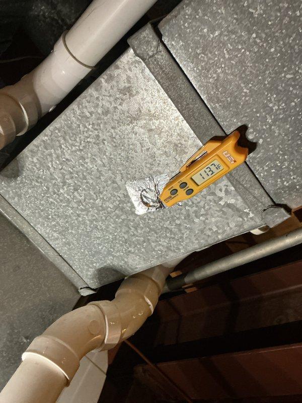Conducted routine HVAC tune-up service with thermal inspection of ductwork system. Temperature readings showed 181°F at measured point on supply duct, indicating proper operation within normal parameters. Inspected and verified integrity of ductwork connections and adjacent PVC plumbing infrastructure.