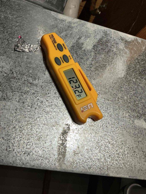 Performed routine maintenance on HVAC system, including inspection of ductwork which showed signs of sediment buildup requiring future attention. Temperature readings taken with UEi thermometer confirmed system operating at 121.2°F, within acceptable parameters for this unit type.