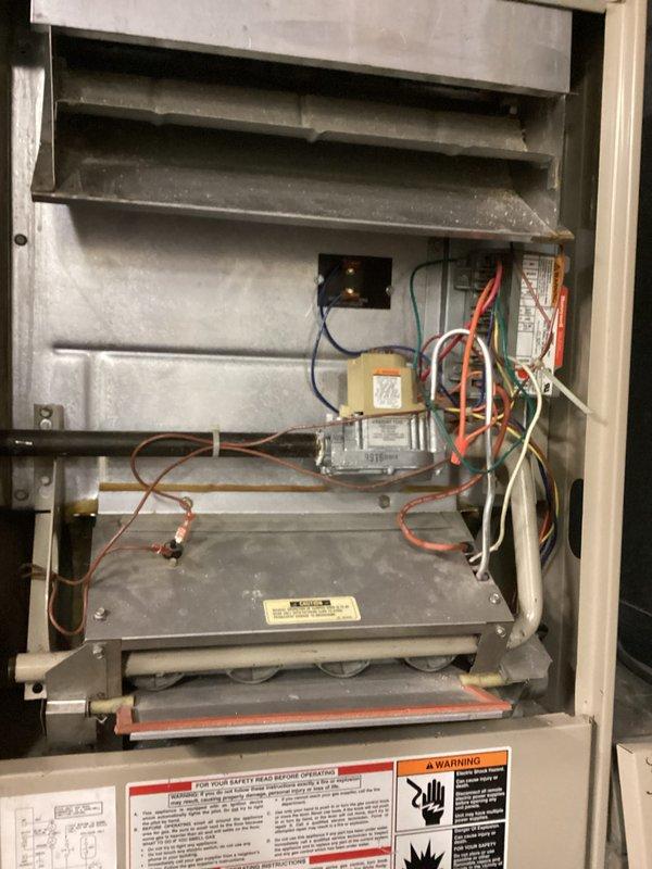 Performed comprehensive tune-up on Lennox "Whisper Heat" furnace. Inspected heat exchanger assembly, burner assembly, and control board for proper operation. Cleaned dust accumulation from internal components and verified integrity of electrical connections, including wiring to Honeywell control module. All systems tested and confirmed to be functioning within manufacturer specifications.