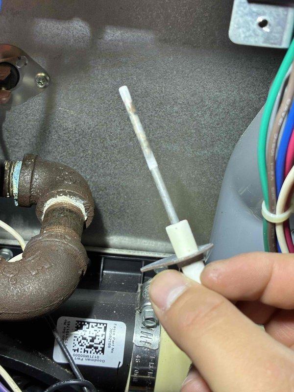 Performed comprehensive HVAC tune-up including inspection of electrical components and ignition system. Removed and checked igniter assembly, noting normal wear. Inspected wiring connections at control board and pressure switch, ensuring proper electrical continuity throughout system. All components tested and verified operational.