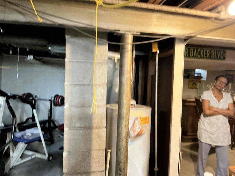 Conducted onsite inspection of existing water heater system in basement utility area. Unit shows visible corrosion and mineral buildup on connecting pipes. Recommended full replacement of aging water heater with appropriate capacity unit to ensure reliable hot water supply and improved energy efficiency.