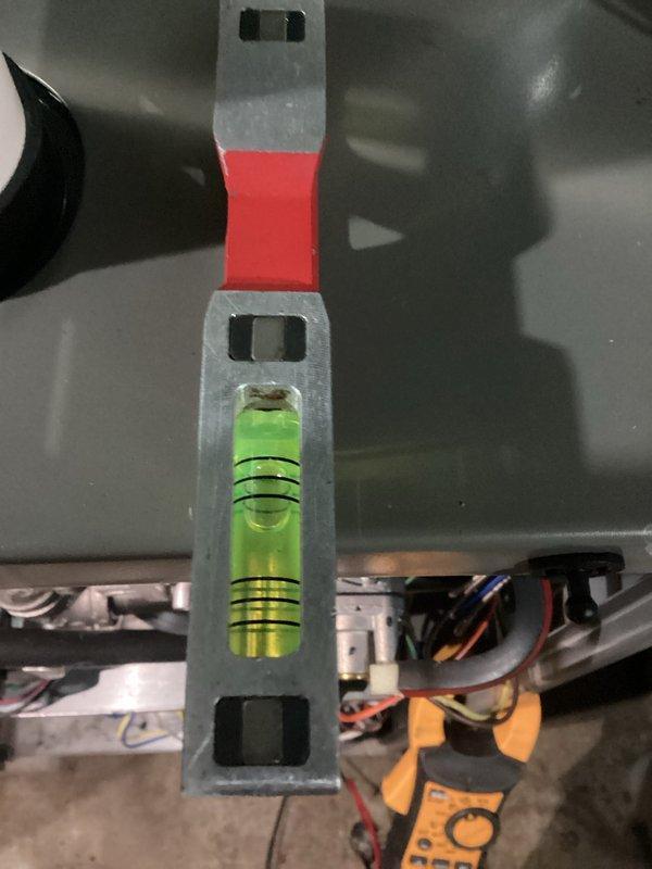 Performed routine HVAC tune-up service in basement utility area. Conducted level testing on system components to ensure proper alignment and operation. All maintenance tasks completed according to manufacturer specifications.