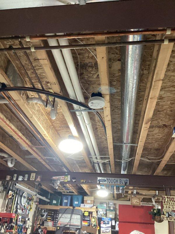 Conducted routine prepaid HVAC maintenance service on customer's furnace system, performing comprehensive inspection of internal components including control board, wiring, and ventilation pipes. Checked all connections and verified proper operation of the unit while examining the ductwork in the unfinished basement for proper installation and airflow.