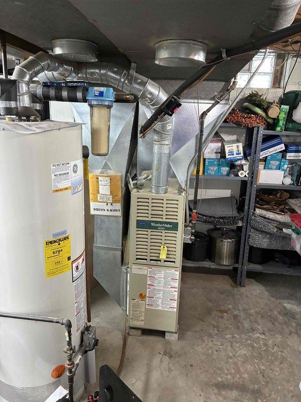 Responded to no-heat call for Carrier WeatherMaker system less than 10 years old. Performed diagnostic testing with multimeter on electrical components and identified faulty limit switch. Replaced limit switch and verified proper system operation, including checking ductwork connections and airflow. System now functioning correctly with normal heating cycle.