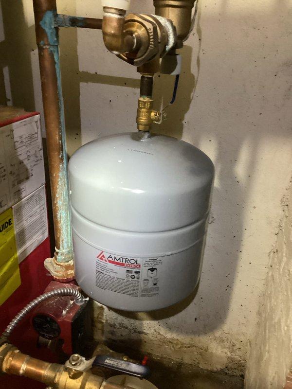 Completed boiler system inspection and maintenance. Identified and resolved copper pipe corrosion at expansion tank connection. Checked proper operation of circulator pump, ensuring system maintains appropriate pressure and expansion capacity.