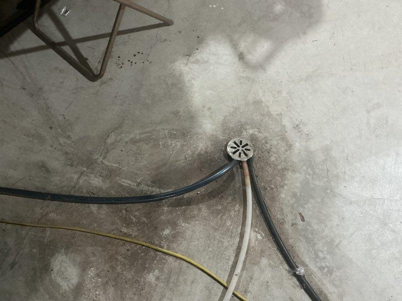 Performed inspection and assessment of Carrier WeatherMaker Infinity furnace system installation in basement utility area. Unit appears properly installed with connected ductwork, electrical wiring, and drainage system. Observed condensate drain with appropriate tubing configuration, though noted some water staining around drain area indicating possible previous drainage issues.