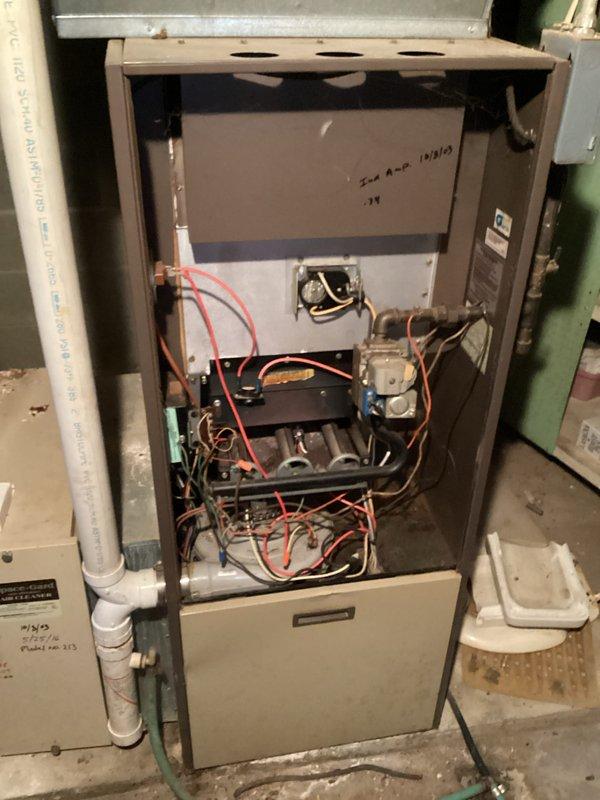 Responded to no-heat complaint on residential furnace under 10 years old. Performed diagnostic inspection revealing failed ignition sequence. Opened access panels to examine control board and gas valve assembly. Detected faulty flame sensor preventing proper burner operation. Cleaned corroded flame sensor contacts and tested system through multiple heating cycles. Unit now functioning properly with consistent ignition and normal heat output.