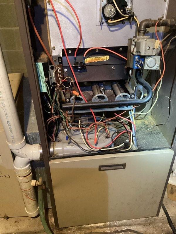 Responded to no-heat complaint on residential furnace under 10 years old. Performed diagnostic inspection revealing failed ignition sequence. Opened access panels to examine control board and gas valve assembly. Detected faulty flame sensor preventing proper burner operation. Cleaned corroded flame sensor contacts and tested system through multiple heating cycles. Unit now functioning properly with consistent ignition and normal heat output.