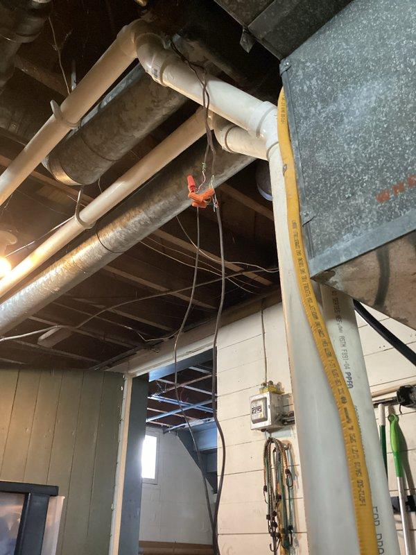 Performed comprehensive maintenance tune-up on residential HVAC system. Inspected interior furnace components including motor assembly, electrical connections, and valve functionality. Examined ceiling/basement ventilation systems, PVC piping infrastructure, and verified proper ductwork installation with attention to electrical connections and system safety parameters.