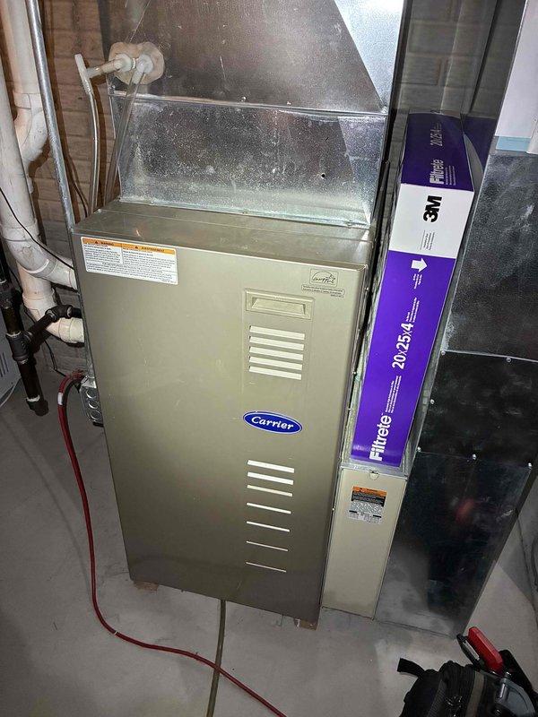 Performed routine tune-up on Carrier HVAC system. Checked supply air temperature (110.1°F) using digital thermometer, confirming proper heating operation. Inspected and verified correct installation of 3M Filtrete 20x25 air filter, ensuring optimal airflow and system efficiency.